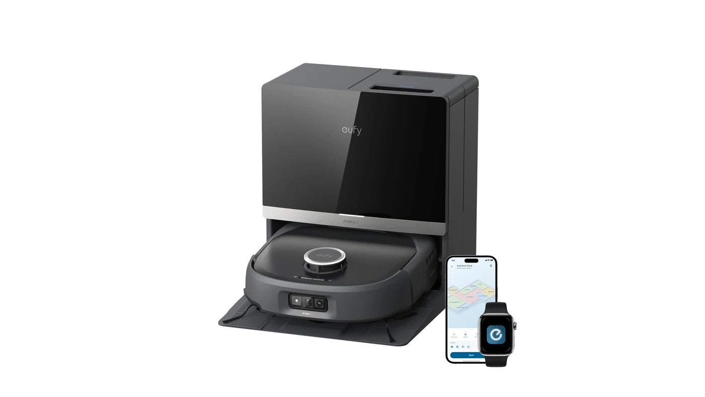 Робот-пилосос Eufy Omni E35 на док-станції поруч зі смартфоном і годинником