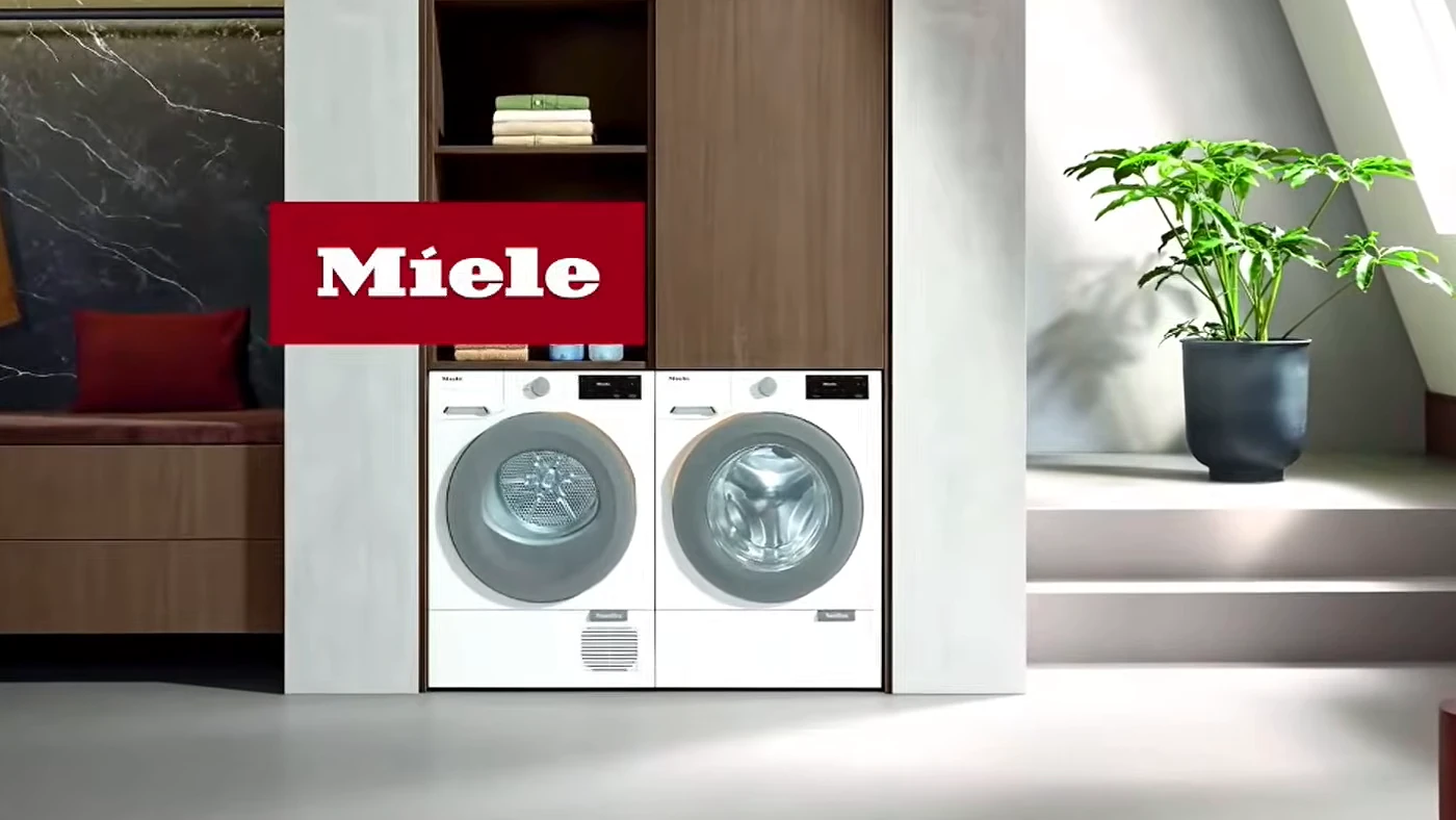 Пральна машина Miele W2 і сушильна машина T2 поруч у пральні